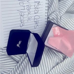 a 1/4cttw 10kwg size 7 engagment ring